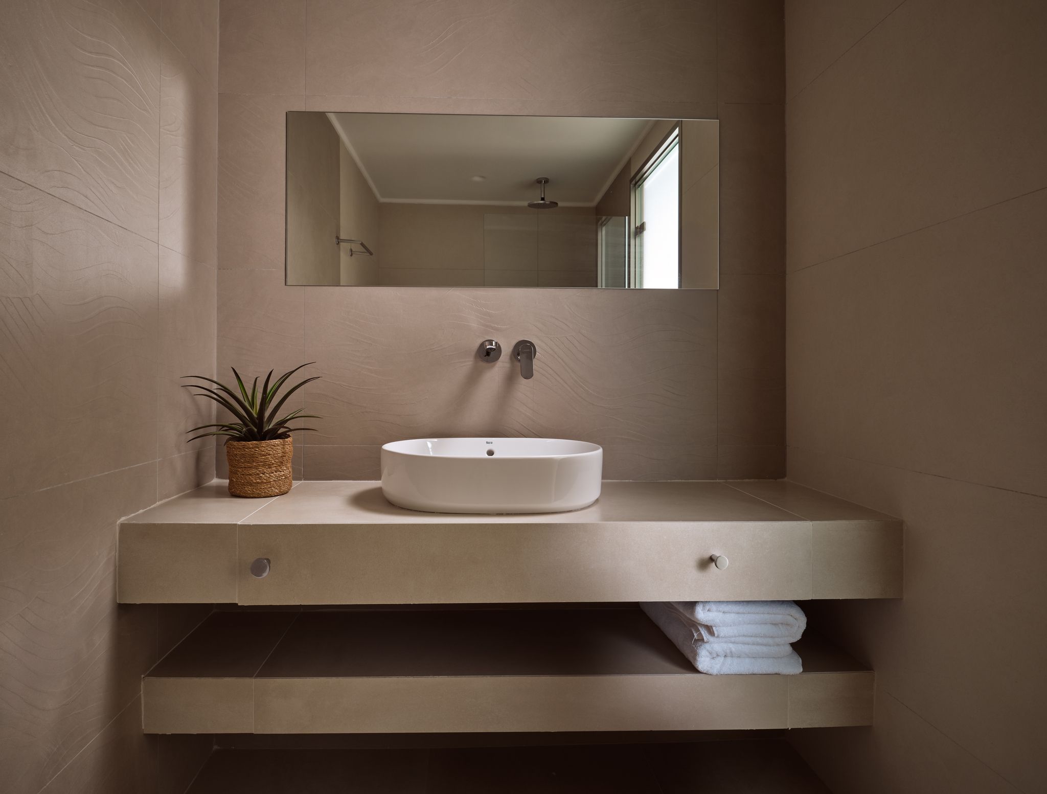 Ensuite bathroom with double stone basin
