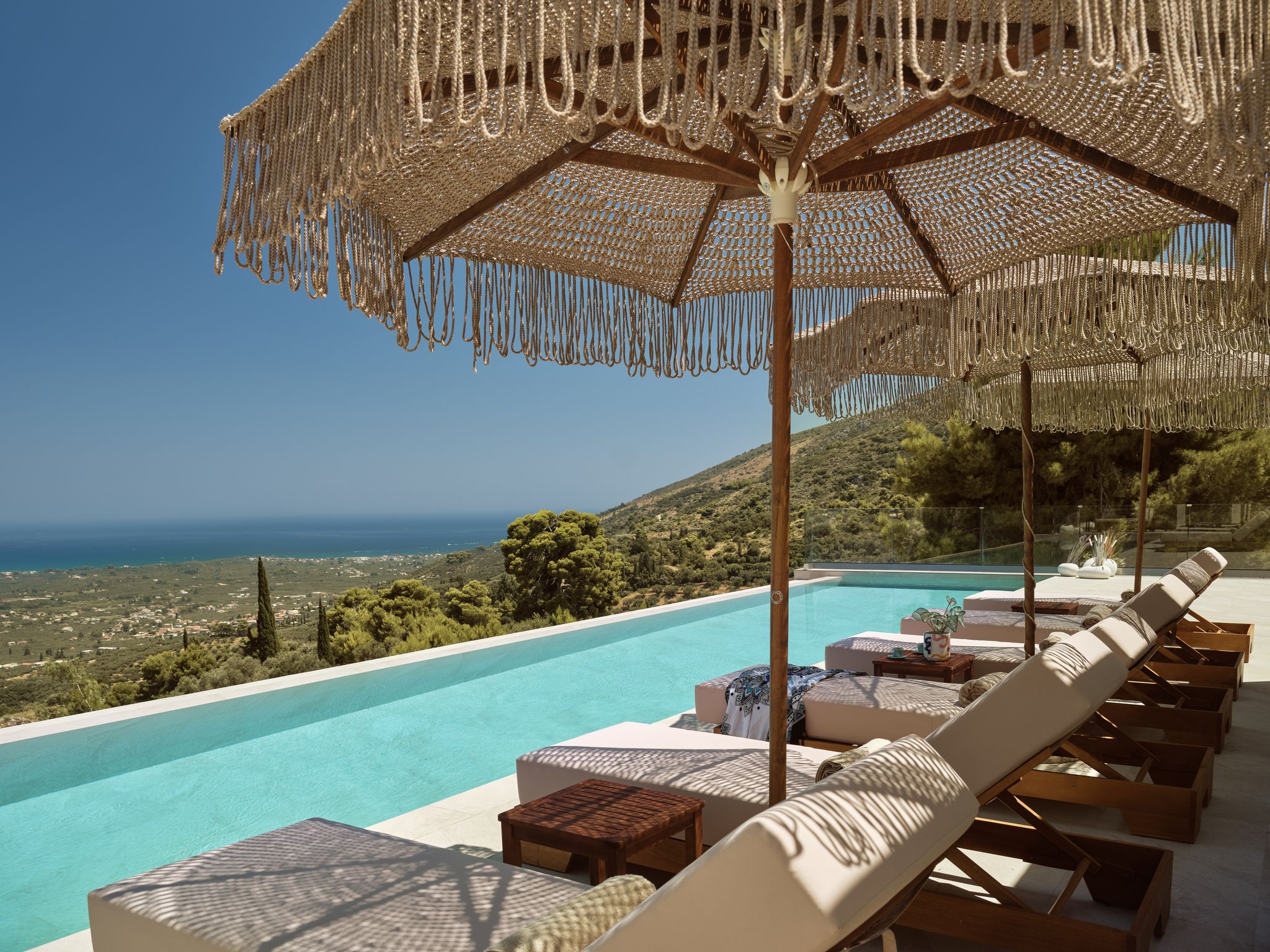 Private turquoise pool with sun loungers at the large group villa in Zakynthos