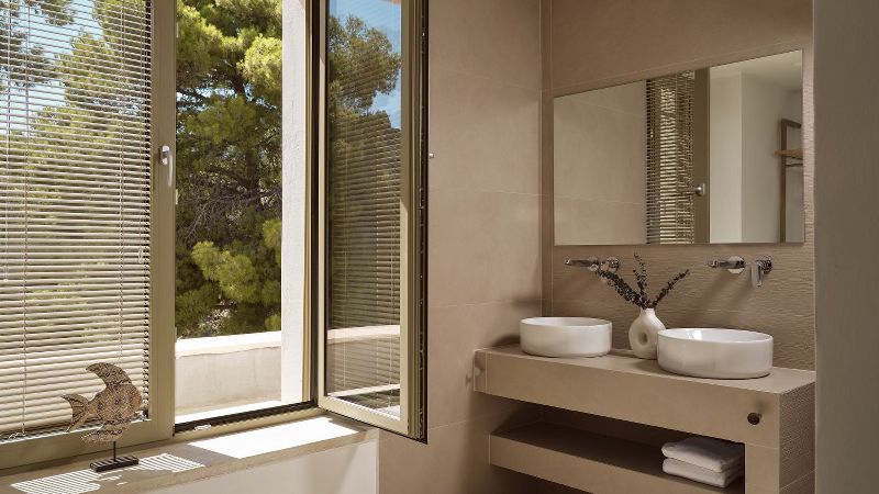 Bathroom with twin basins and window – Segreto Del Lusso, Zakynthos